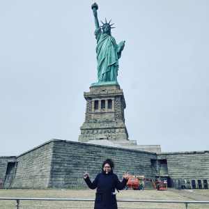 Pierina Reyes at the Statue of Liberty